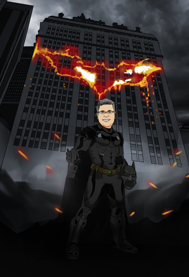 man standing in batman costume infront of a burning tower