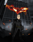 man standing in batman costume infront of a burning tower