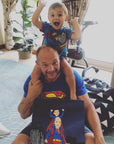 father's day gift with dad and son in super man costume as a cartoon canvas